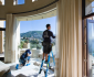 Window cleaning in a beautiful home on the beach