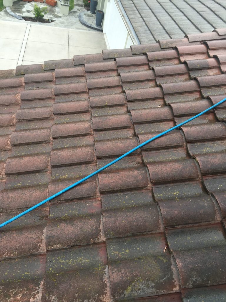 Before roof cleaning began, a lot of dirt from years of build up